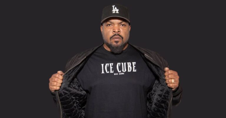 Ice Cube performing on stage, showcasing his success in music and business.