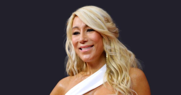 Lori Greiner smiling at a business event, showcasing her success as the Queen of QVC.