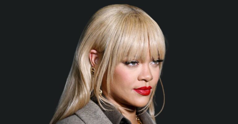 Rihanna posing at a Fenty Beauty event, representing her billion-dollar empire in 2025.